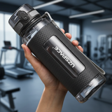 Garrafa Gym Colors UZSPACE® — Cinza (segurando na mão)